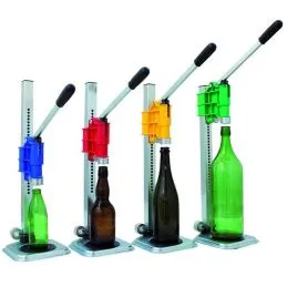 Lever capping machine for crown caps